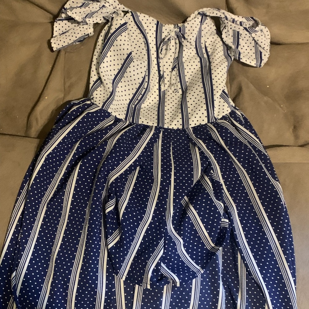 Short romper with long piece in back